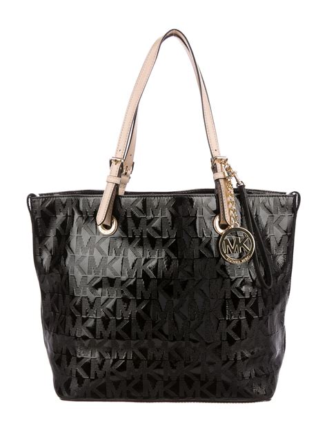 ciondolo michael kors|Michael Kors leather tote.